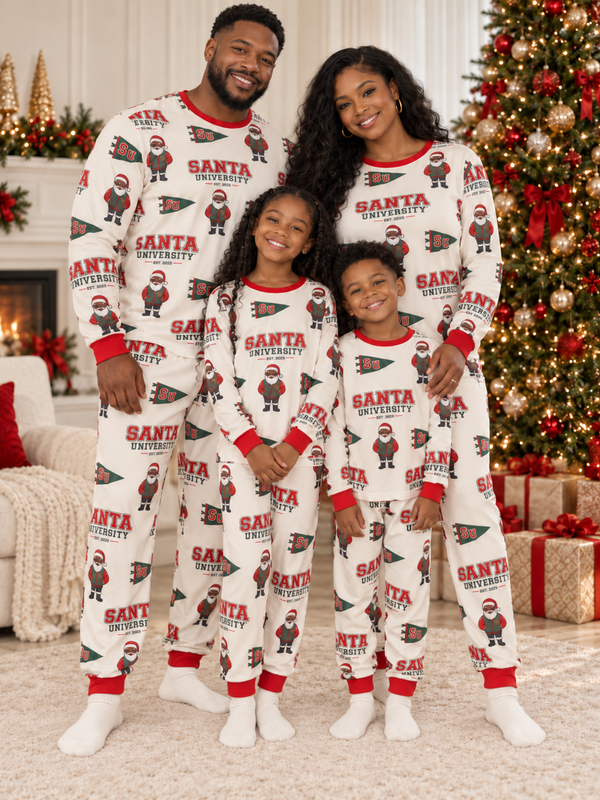 Black family of four in Santa Is On the Yard matching pajamas and plain ivory socks