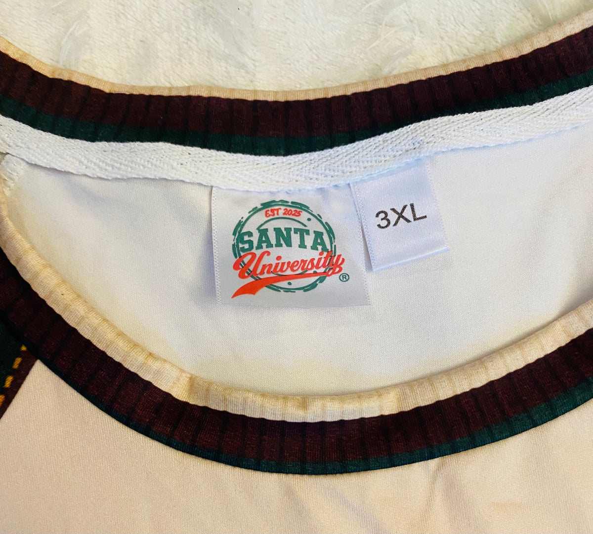 Santa University sewn brand label and 3XL size tag inside the pajama neckline